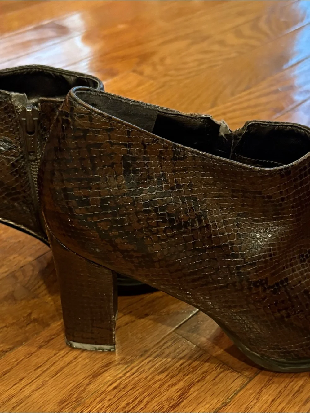 Nine West brown snake embossed square toe leather ankle boot.